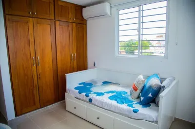 Modern 3 Bedroom Apartment with Wifi & AC Located Minutes From Airport Hotels in 