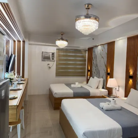 Relax in Pasay City's Best Kept Secret - Spacious Condo with Garden View