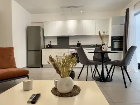 Welcome to Our Luxurious 1-Bedroom Private Residence with a Special Patio Отели в г. Агланција