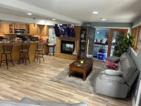 Comfy lake home  on the water mins from cp, sports force, downtown and the jet