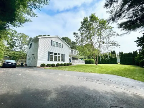 Spacious 5Bdrm Home- Saltwater Pool, WiFi, AC, Private Beach Parking Pass