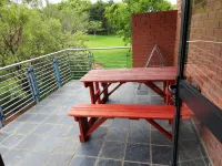 Apartment with Lush green garden and a Pool