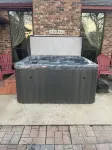 Country home with a brand new hot tub, WiFi and central air, spacious bad yard