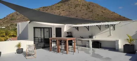 Superbe Appartement Avec vue mer et Montagnes Отели рядом с достопримечательностью «Тамарин Паблик Бич»