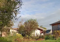 Das Pustehus in Grödersby, Weitblick Über Wiese und Feld zur Schlei Hotels in Grödersby