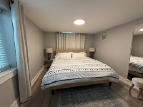 Luxury lower level , pet friendly, fully fenced yard