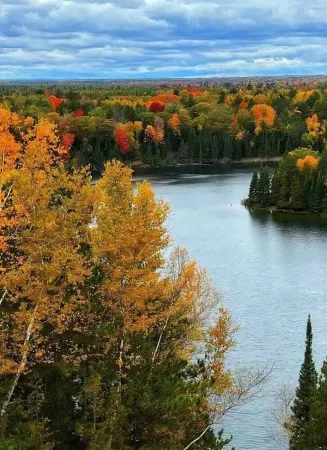 3 bedroom log cabin the lake plus a guest house.  30 mintues from Traverse City