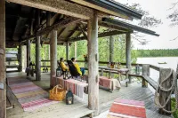 Isokenkäisten Klubi - Wilderness Lodge