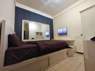 Roomy Guesthouse Hotels in Tlogomas