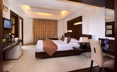 The President Hotel Hoteles cerca de Art of Living International Center