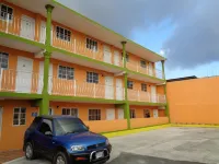 Tropical Manor Inn - Kingston Отели в г. 