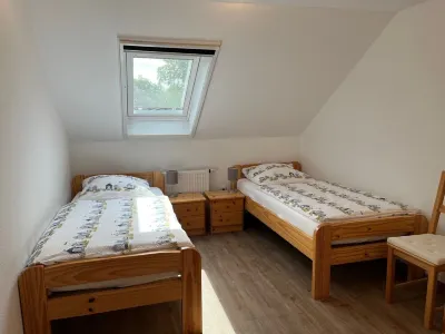 Vacation apartment for 4 people (+ two babies / toddlers) with very large garden Hotels near Muhlenmuseum Pewsum