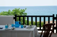 Typical Mediterranean home by the sea with large terrace