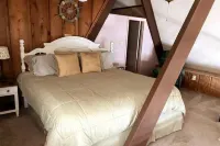 Cozy A-Frame Cabin on False River Party Barges Available on Request