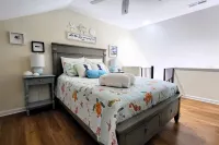 Beachfront 2-bedroom townhome, private beach access, outdoor space & amenities.