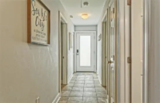 Bright and Airy Condo.  One block to the Beach.  Great location.