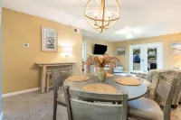 New Listing!  Ground Floor, Elegant 2 Bedroom Condo minutes from the beach.