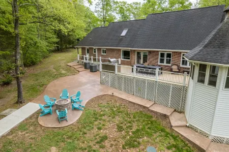 Beautiful and Private 6000 sqft waterfront home with private dock and hot tub!