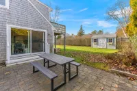 Walk to beach, fenced yard, and toys for the kids!
