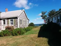 Beachfront cute cottage on Private  Beach. Best View on the Cape.  on high bluff