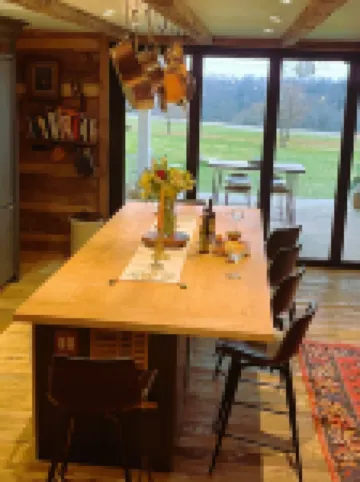 Historic Log Cabin fully restored; gourmet kitchen & much more!