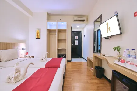 @Hom Premiere Abepura by Horison Отели в г. Wai Mhorock