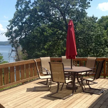 Experience Kentucky Lake out the back door! Spacious 4-bedroom retreat awaits.
