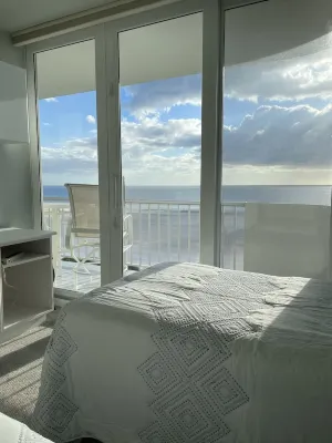 Wake up to the Sound of Waves and Panoramic Gulf Views at This Beachfront Condo Hotel in zona Marco Island Water Sports