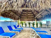 “ Living the Dream “ in our 3 bedroom 3 bathroom beachside condo with pool!