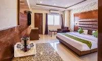 Treebo Grand Legacy Elite with Roof Top Cafe Hotels near ShivPuri Mata Mandir