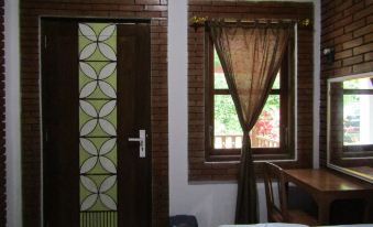 Penginapan Udin Syariah Bukit Rhema by Zuzu