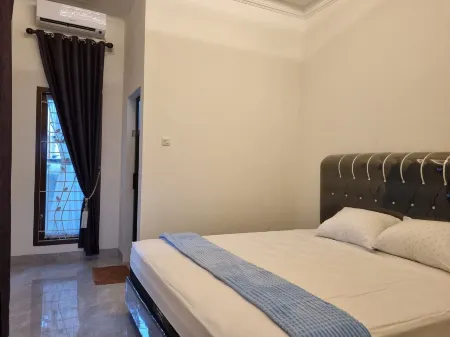 Wafaby Guest House Отели в г. Kototuo Limokampuang