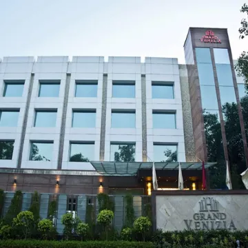 Venizia Sarovar Portico Hotels near Miranda House