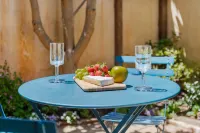 Lush Gardens and Unique Fire Pit - Charming Oasis Retreat