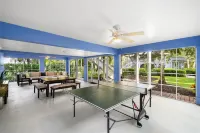 Community Pool Views and Spacious Verandas - Charming Island Retreat