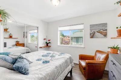 Contemporary dog-friendly home with backyard, patio, washer/dryer, pellet stove