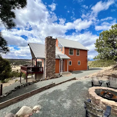 Spectacular panoramic mtn views from this majestic 3 acre luxury chalet retreat