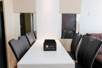 Homey and Cozy 2Br Apartment at Tamansari la Grande