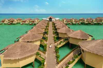 Palafitos Overwater Bungalows, Catamarán, Cenote & More Inclusive