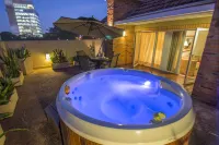 Hotel Villa Morra Suites - ที่มีอ่างอาบน้ำ