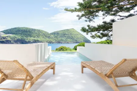 Silveira Bay Lounge Retreat Отели в г. Ангра-ду-Эроижму