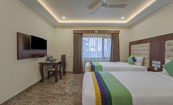 Treebo Aaravi Residency, 800 Mtrs from Promenade Beach