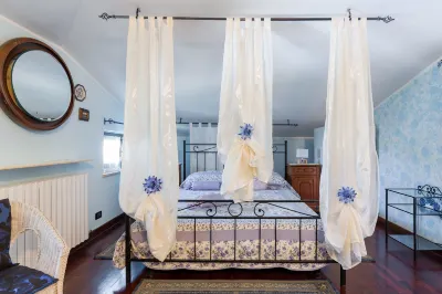 Au Jardin Fleuri Hotels in Zevio