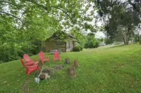 Creekside historic log cabin w/ modern amenities at historic Wade's Mill