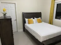 Cozy yet elegant Jamaican vacation home with access to pool, beach, gym etc