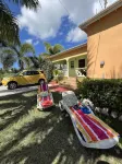 Two bedroom, 2 bathroom house in a tropical palm and garden setting.