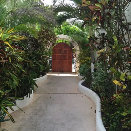 Quiet and serene ocean front 2-bedroom 2-bathroom condo, steps from the sand!