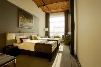 Fabryka Wełny Hotel & Spa Hotels in Паб'яніце