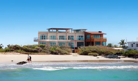 Iguana Crossing Boutique Hotel Отели в г. Исабела