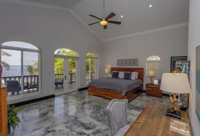 An unBELIZEable home...Barefoot beachfront luxury!